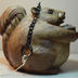 Bird Feeder: Brown Plastic Squirrel Bird Feeder